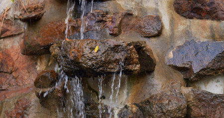 Waterfall in tropical Asian rainforest is the best place for summer vacation. Waterfall from stones...