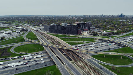 Busy urban roads intersecting, aerial perspective, essence of city commuting. Infrastructure maze:...