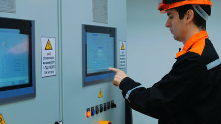 Operator manually adjusts equipment parameters via control panel, using artificial intelligence...