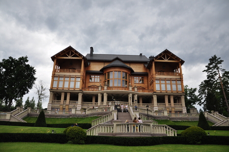 Kiev, Ukraine. Wooden Honka, the former residence of the President of Ukraine Viktor Yanukovych in Mezhyhiriaのeditorial素材