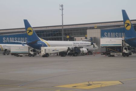 The plane near the terminal at the airport Borispol, Ukraine, 10.09.2017のeditorial素材