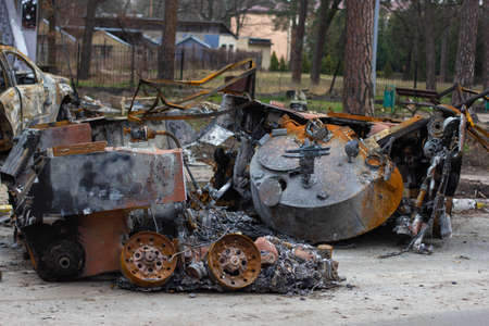 Bucha, Kyiv region, Ukraine - April 5, 2022: War between Russia and Ukraine. Consequences of the war, wrecked military equipment of the Russian army. Remains of military equipment.のeditorial素材