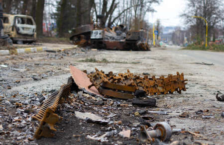 Bucha, Kyiv region, Ukraine - April 5, 2022: War between Russia and Ukraine. Consequences of the war, wrecked military equipment of the Russian army. Remains of military equipment.のeditorial素材