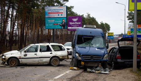 Bucha, Kyiv region, Ukraine - April 5, 2022: War between Russia and Ukraine. The consequences of the war, the damaged car of civilians by the troops of the Russian army. shot car.のeditorial素材