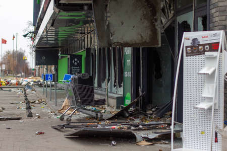 Bucha, Kyiv region, Ukraine - April 5, 2022: War between Russia and Ukraine. Consequences of the war, damaged grocery market by the troops of the Russian army.のeditorial素材