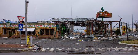 Stoyanka, Kyiv region, Ukraine - April 2022: Russia Ukraine War. A bombed-out gas station. Destroyed gas station. Consequences of the attack of the Russian armyのeditorial素材