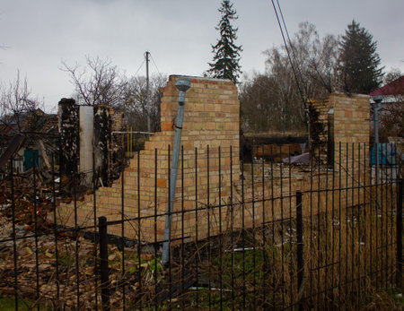 Motyzhin, Kyiv region, Ukraine - April 2022: Russia Ukraine War. The consequences of the war, a destroyed house after the bombing of the Russian armyのeditorial素材