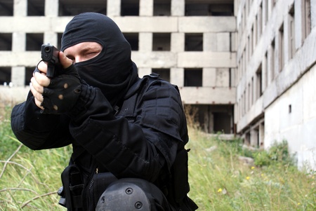 Special division. The man. The weapon. A military uniform.の写真素材