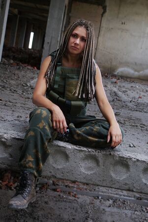 The young woman. A military uniform. Gogglesの写真素材