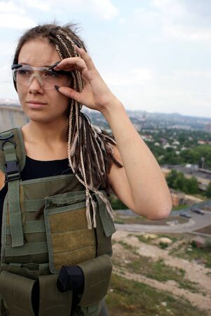 Portrait of the young woman. A military uniform. Gogglesの写真素材