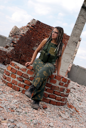 Portrait of the young woman. A military uniform. Gogglesの写真素材