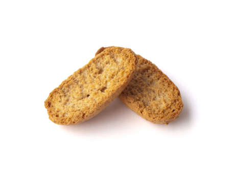 Two pieces of dry bread on a white backgroundの写真素材