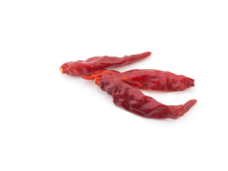 Red dry chili pepper isolated on white backgroundの写真素材