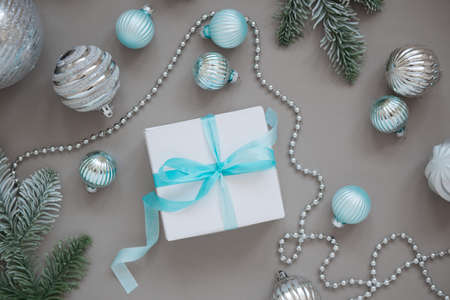 New year and Christmas tree decorations on grey backgroundの写真素材