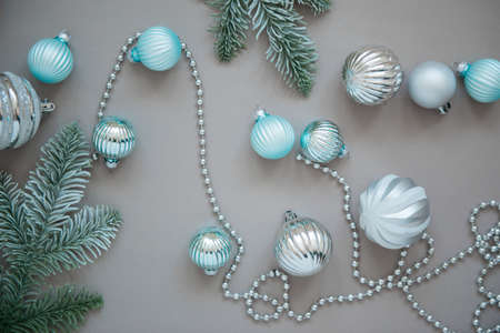 New year and Christmas tree decorations on grey backgroundの写真素材