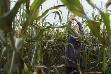Young woman walking at countrysideの写真素材