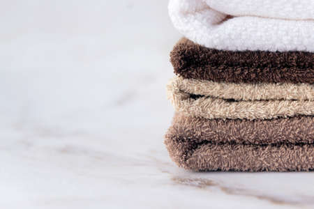 pack of terry cotton towels in bathroom natural colors copy spaceの写真素材