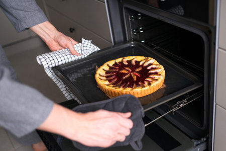 cooking fruit and berry pie at homeの写真素材