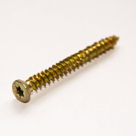 depicted on the photo of the yellow metal screw.の写真素材