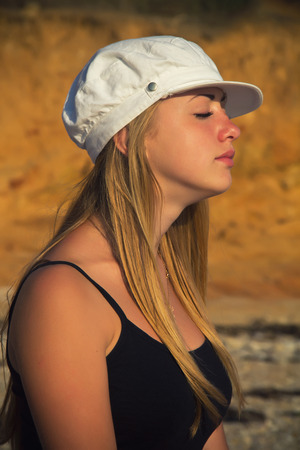 The photo shows a young beautiful girl. の写真素材