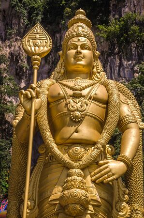 KUALA LAMPUR, MALAYSIA - DECEMBER 18, 2018: Lord Murugan's statue, Batu cave, Malaysia, dedicated to Tamil God Lord Murugan, Cave was built in 1920.のeditorial素材
