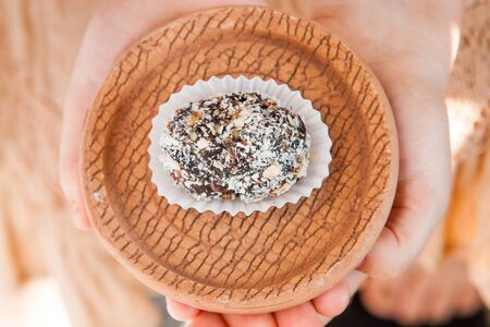 Homemade candy with prune, peanut and coconut flakesの写真素材