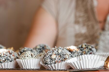 Homemade candy with prune, peanut and coconut flakesの写真素材