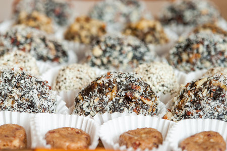 Homemade candy with prune, peanut and coconut flakesの写真素材