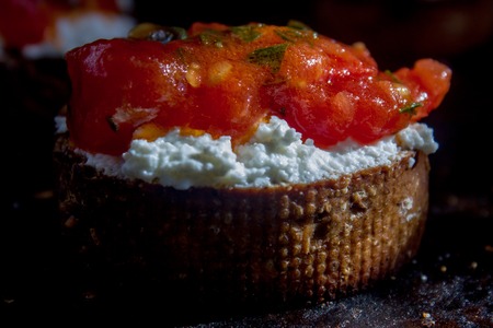 Bruschetta with ricotta cheese and tomato sauceの写真素材