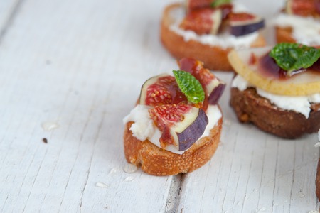 Bruschetta with goat cheese and figsの写真素材