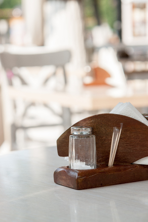 Table served for dinner in a street restaurant or cafe.の写真素材