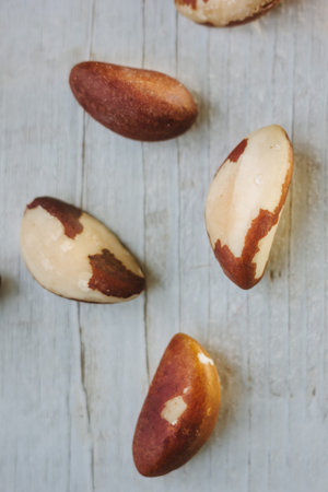 Brazil nuts over the white wooden table