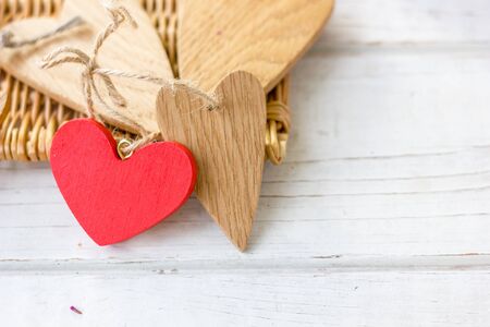 Valentine's day hearts on white wooden background.の写真素材