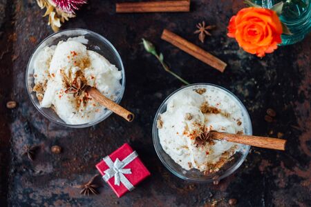 Top view of ice cream dessert and gift box near itの写真素材