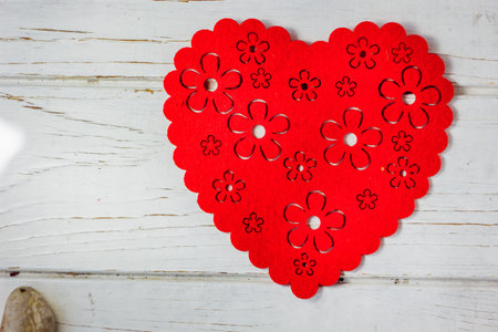Big red heart over the white background