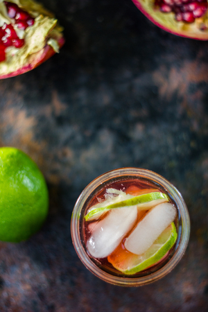 Top view of fresh pomegranate lemonade on rustic boardの写真素材