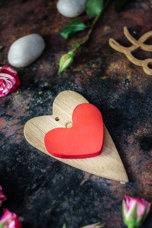 Valentine's day background. Two valentine's hearts on rustic surfaceの写真素材