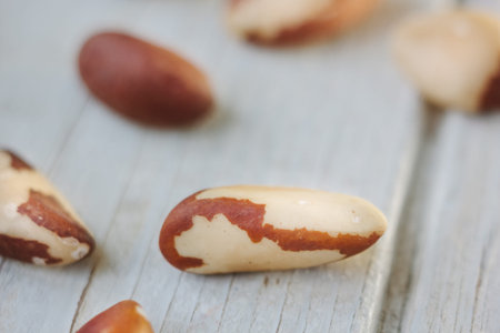 Brazil nuts over the white wooden tableの写真素材