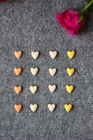 Hearts background on gray clothの写真素材