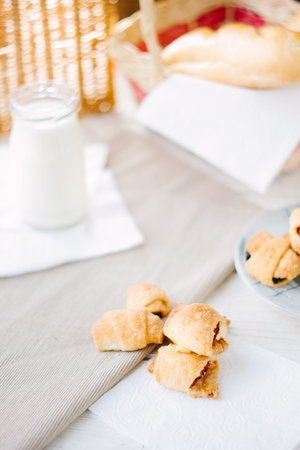 Organic breakfast - home made bagels on tableの写真素材