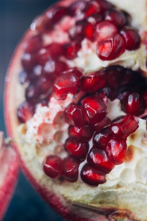 Close view of red pomegranate fruit seeds.の写真素材