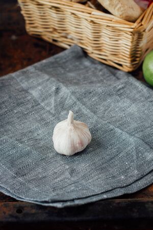 Nice garlic on piece of fabric material.の写真素材