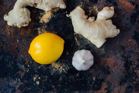 Citrus fruits with garlic and ginger root.の写真素材