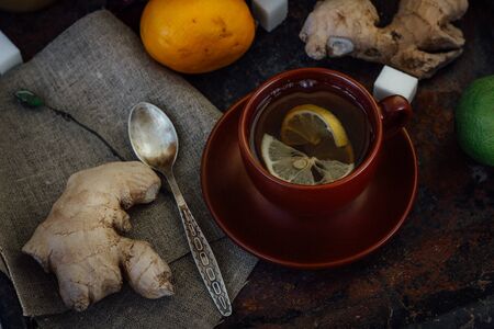 Ginger tea with lemon, lime and sugarの写真素材