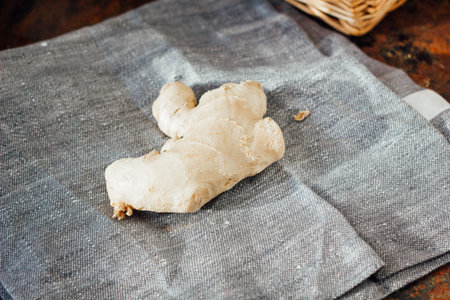 ginger root on piece of fabric material.