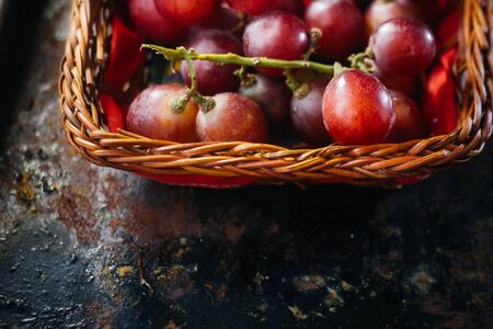 Top view of basket filled by grapes.の写真素材