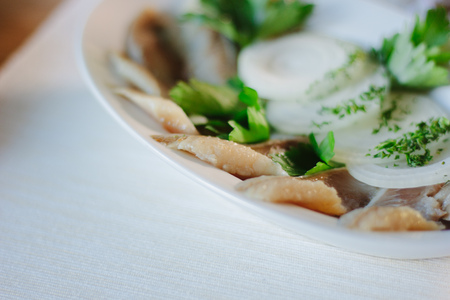 Seafood - salty fish herring ready to eat.の写真素材