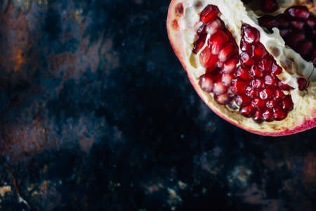 Top view of pomegranate quarter, juicy and sweet.の写真素材