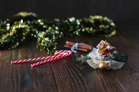 Christmas decoration with pinecone on wooden board