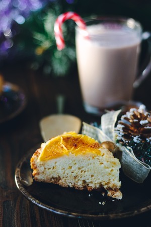Shot of christmas pie - delicious cake over the dark tableの写真素材